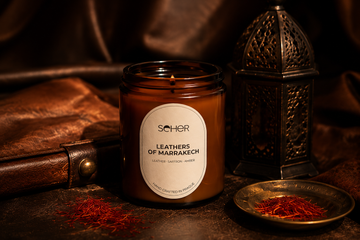 Seher Leather of Marrakech luxury scented candle in an amber glass jar inspired by the rich leather souks of Marrakech.