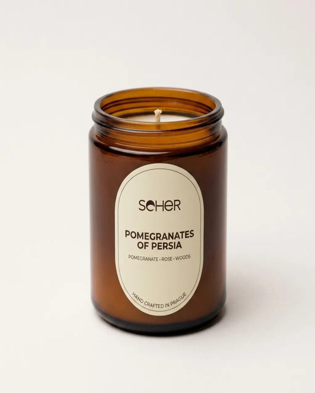 Seher Pomegranates of Persia luxury scented candle in amber glass handcrafted in Prague.